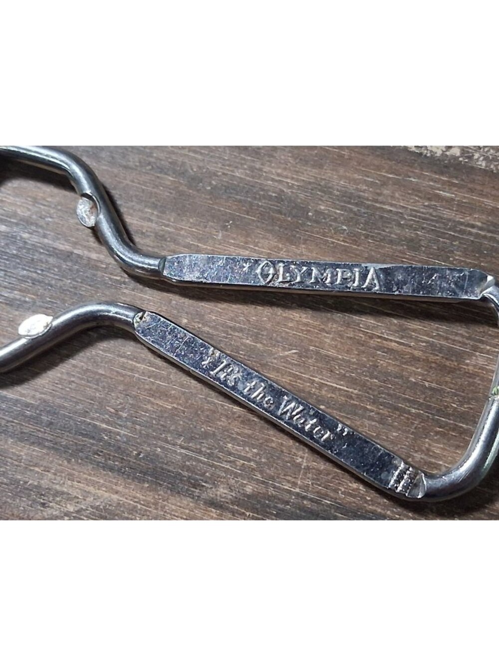 Circa 1950's Olympia Beer Bottle Opener Vaughan Silver Tone It's The Water
